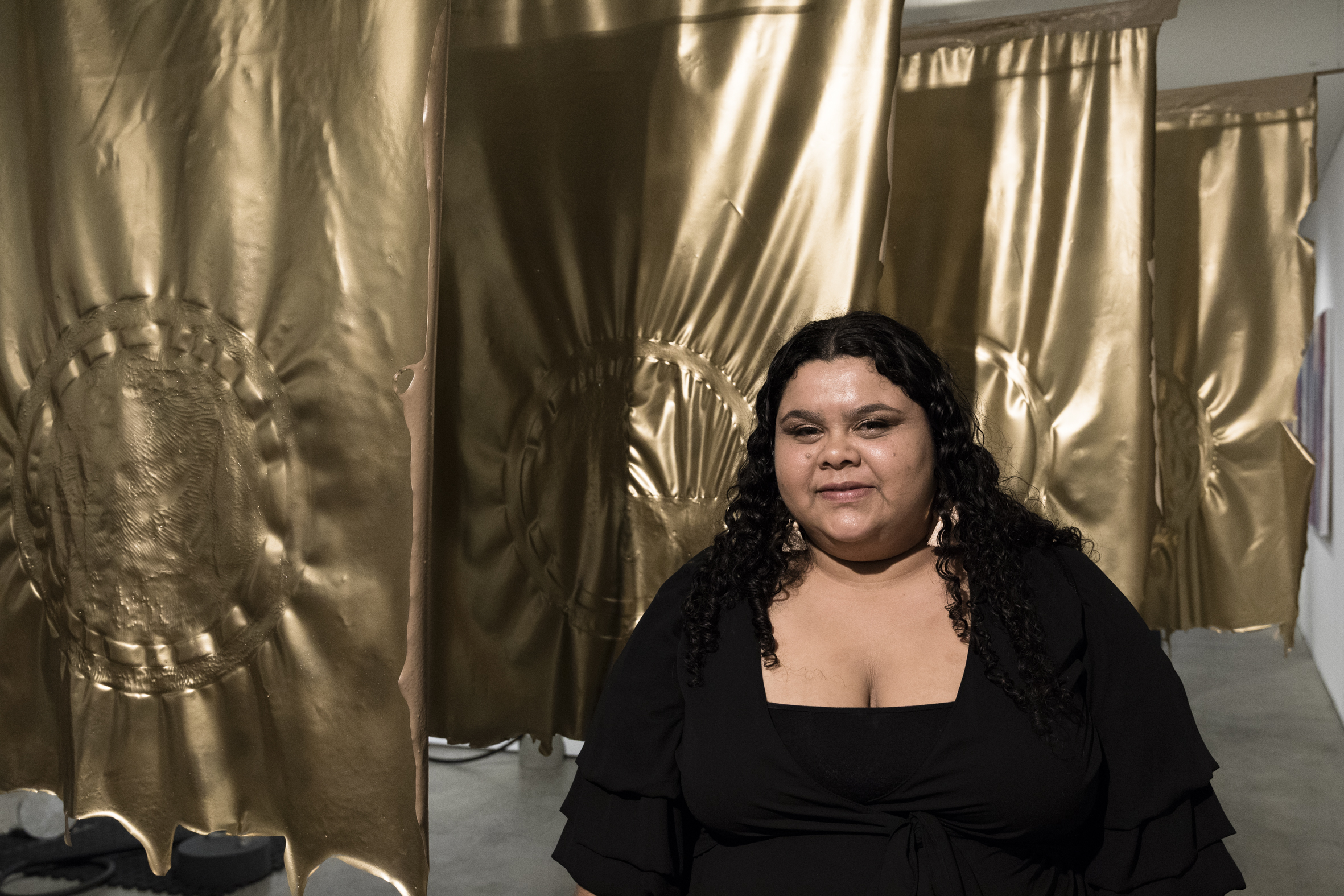 Graduate Carmen Glynn-Braun with her prize-winning work Untitled 2018. Photo: Silver Salt Photography