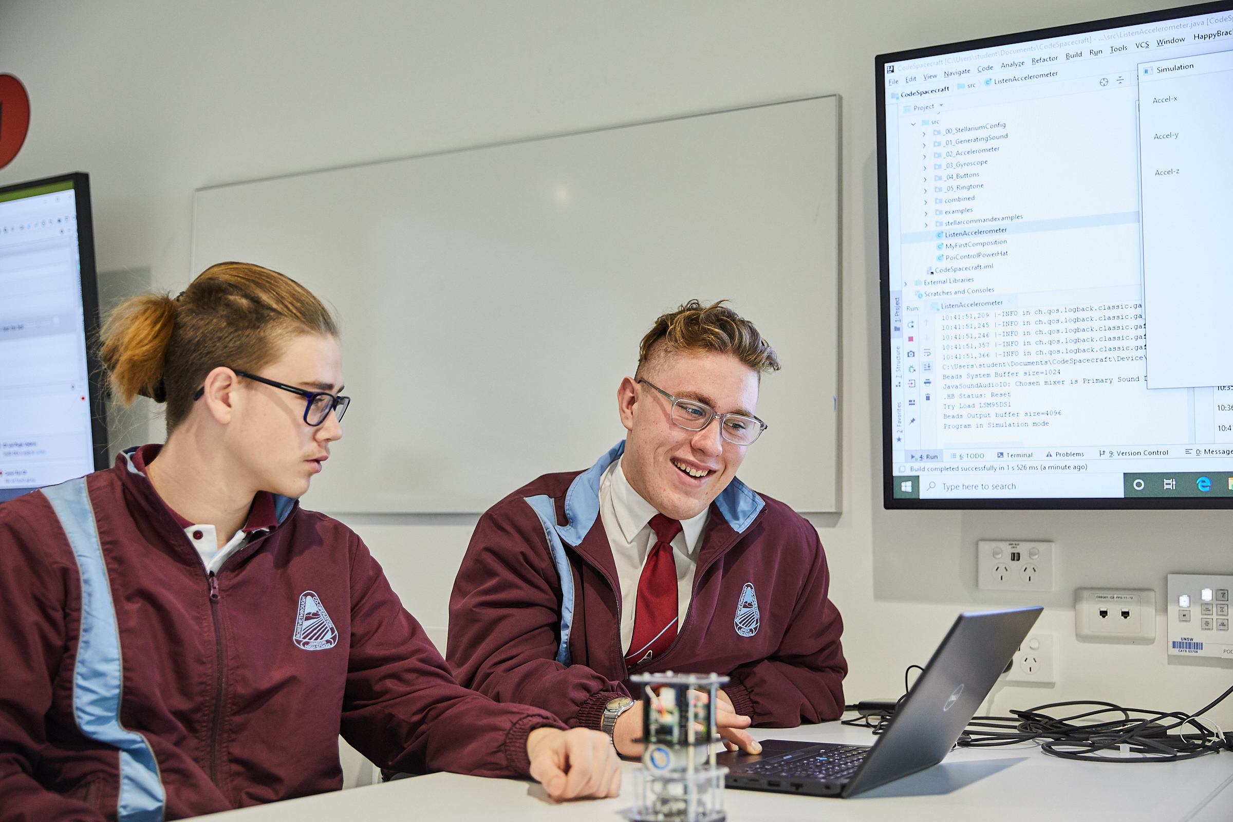 High School students Kobi Hind (left) and Connor Burke (right) experience a creative coding workshop as part of National Science Week