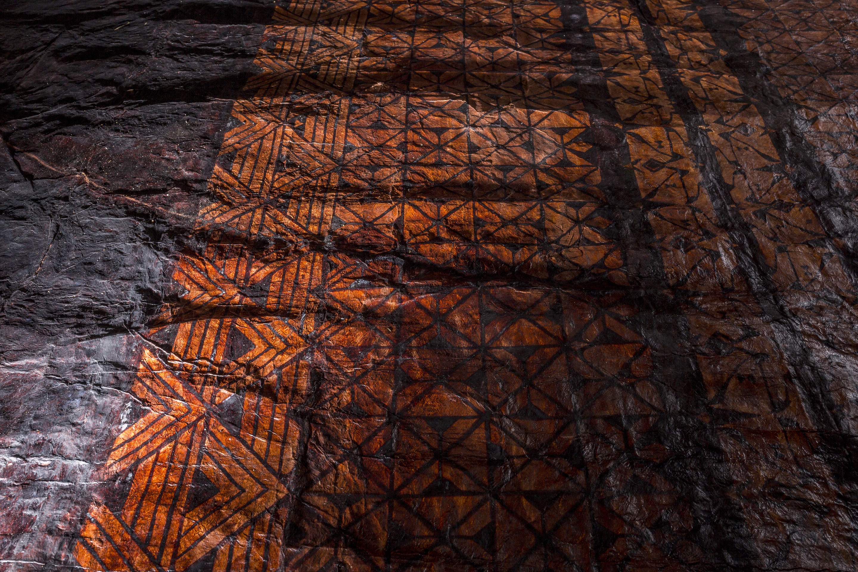 Lototō1 2016 (detail). Earth pigments, natural dyes and tuitui (Candlenut soot) on ngatu (barkcloth). Image courtesy - the artist. Photograph - Arnaud Elissalde