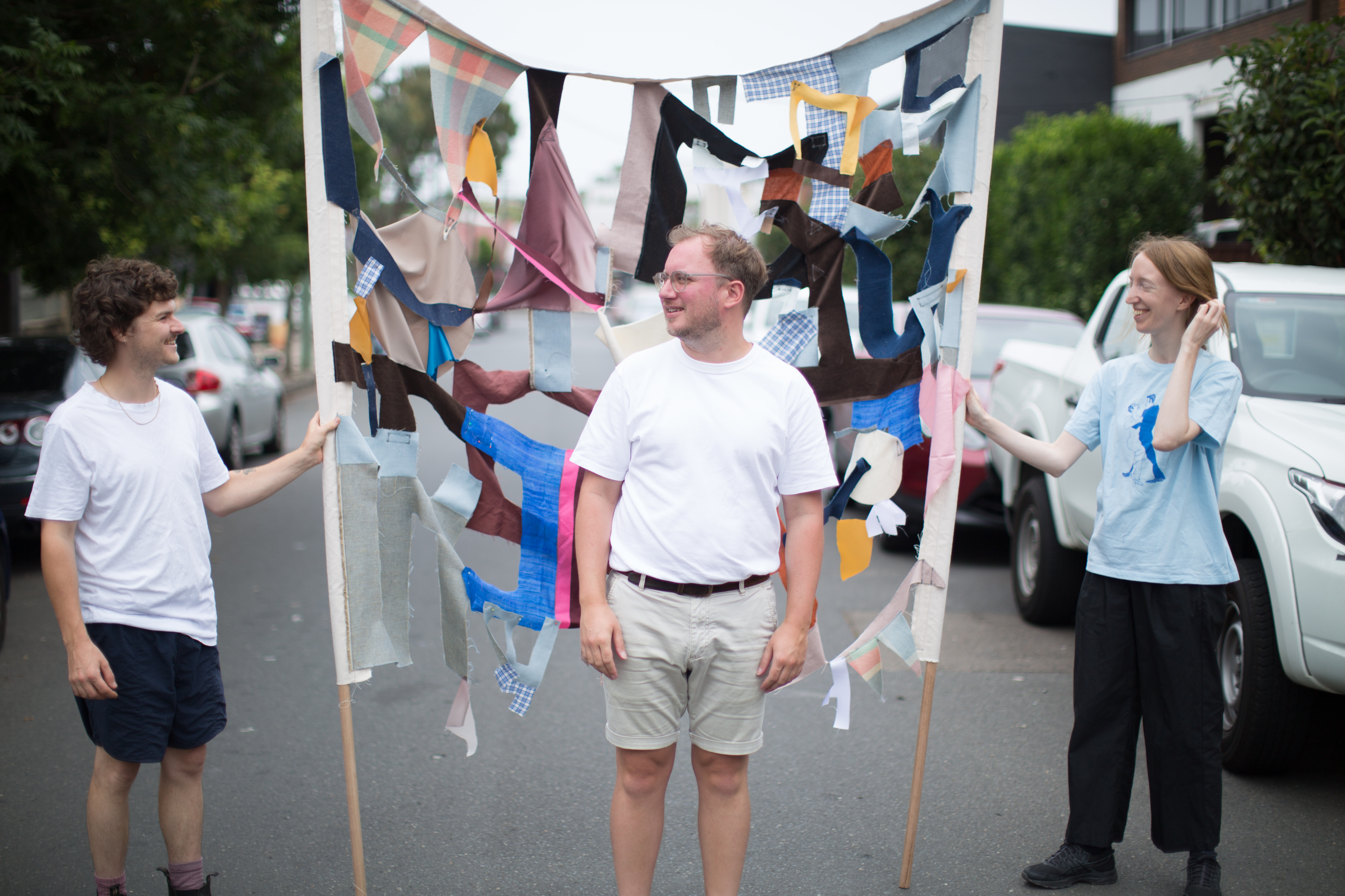 The shapes within the textile banners are abstracted from the phrase 'Who's laughing jackass', UNSW Honours students Joshua Reeves and Lisa Dwyer with artist Fernando do Campo